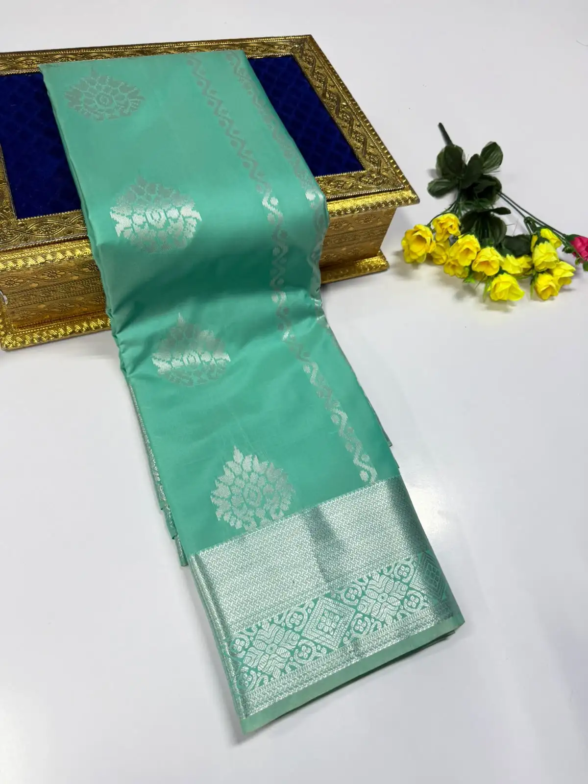 Large Floral Round Zari Butta Silver Brocade Border Semi Kanchipuram Silk Saree